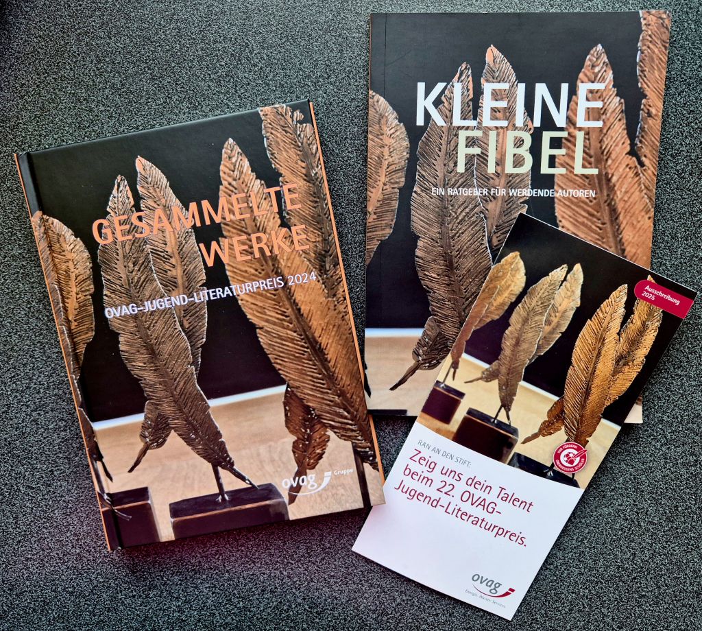 OVAG-Lesung - Bücher und Flyer: Gesammelte Werke 2024, kleine Fiebel und Flyer "Zeig uns dein Talent"